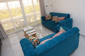 Departamento Deluxe | Área de sala de estar