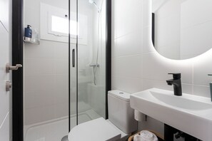 Hair dryer, towels, shampoo