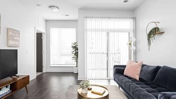 Deluxe Apartment, 3 Bedrooms | Living area | 42-inch Smart TV with digital channels, Netflix, Hulu