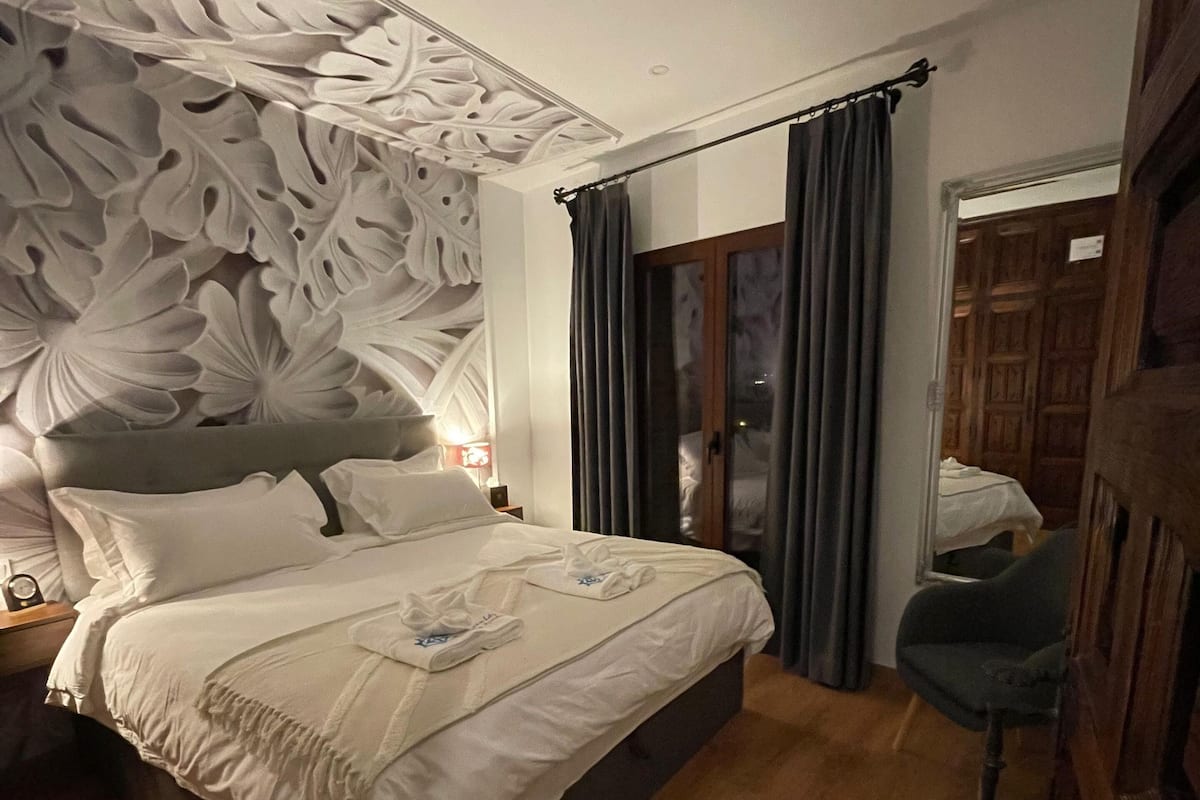 Lägenhet Business - 1 sovrum - icke-rökare - utsikt mot resort | 1 sovrum, italienska Frette-lakan och sängtillbehör av högsta kvalitet