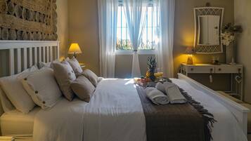 2 dormitorios, tabla de planchar con plancha, cuna de viaje