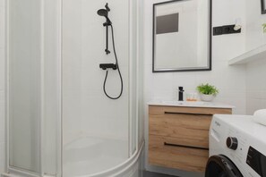 Shower, hair dryer, shampoo