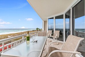 Outdoor dining - Blue Sky-Gulf front resort w/pool, gorgeous views! (Navarre)