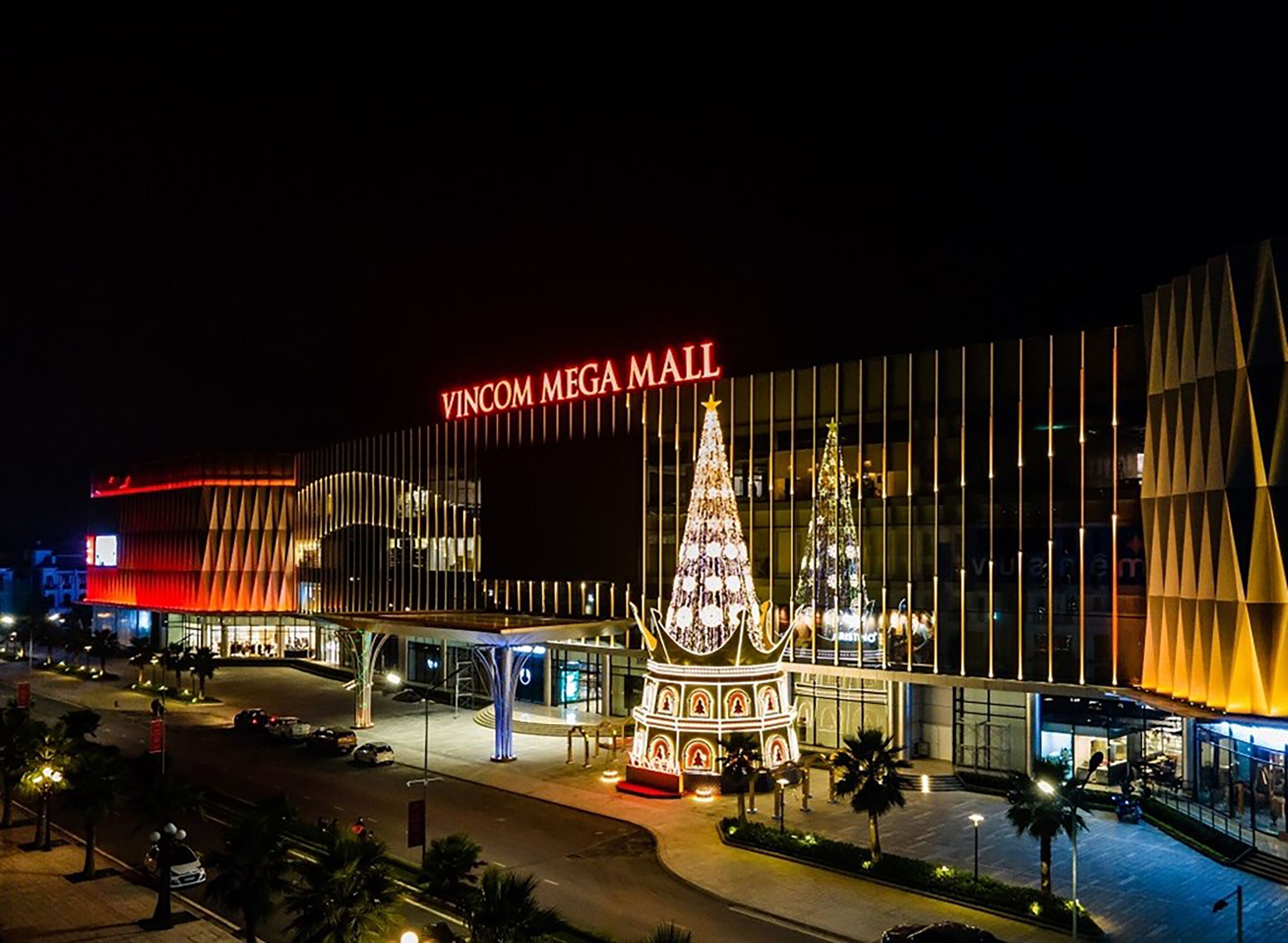 Vincom Mega Mall with illuminated signage and a large Christmas tree.