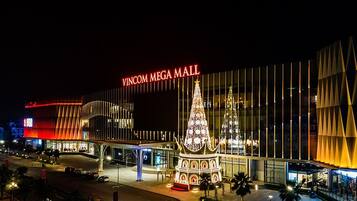 Vincom Mega Mall with illuminated signage and a large Christmas tree.