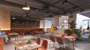 Un restaurante moderno con paneles de madera, varias mesas para comer y una zona de bar.