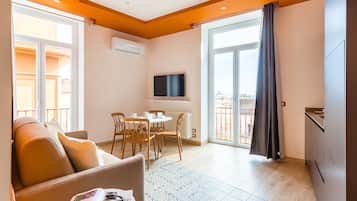 Apartamento urbano | Área de estar | TV 35 polegadas com canais digitais