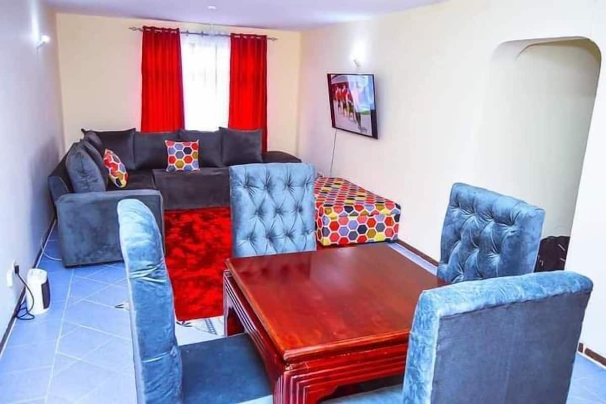 Executive Apartment | Ruang tamu | 24 inci sebuah televisyen pintar dengan digital