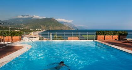Porpora   Apartment with sea view located inside the Residence le Ruve Bianche with swimming pool and private beach