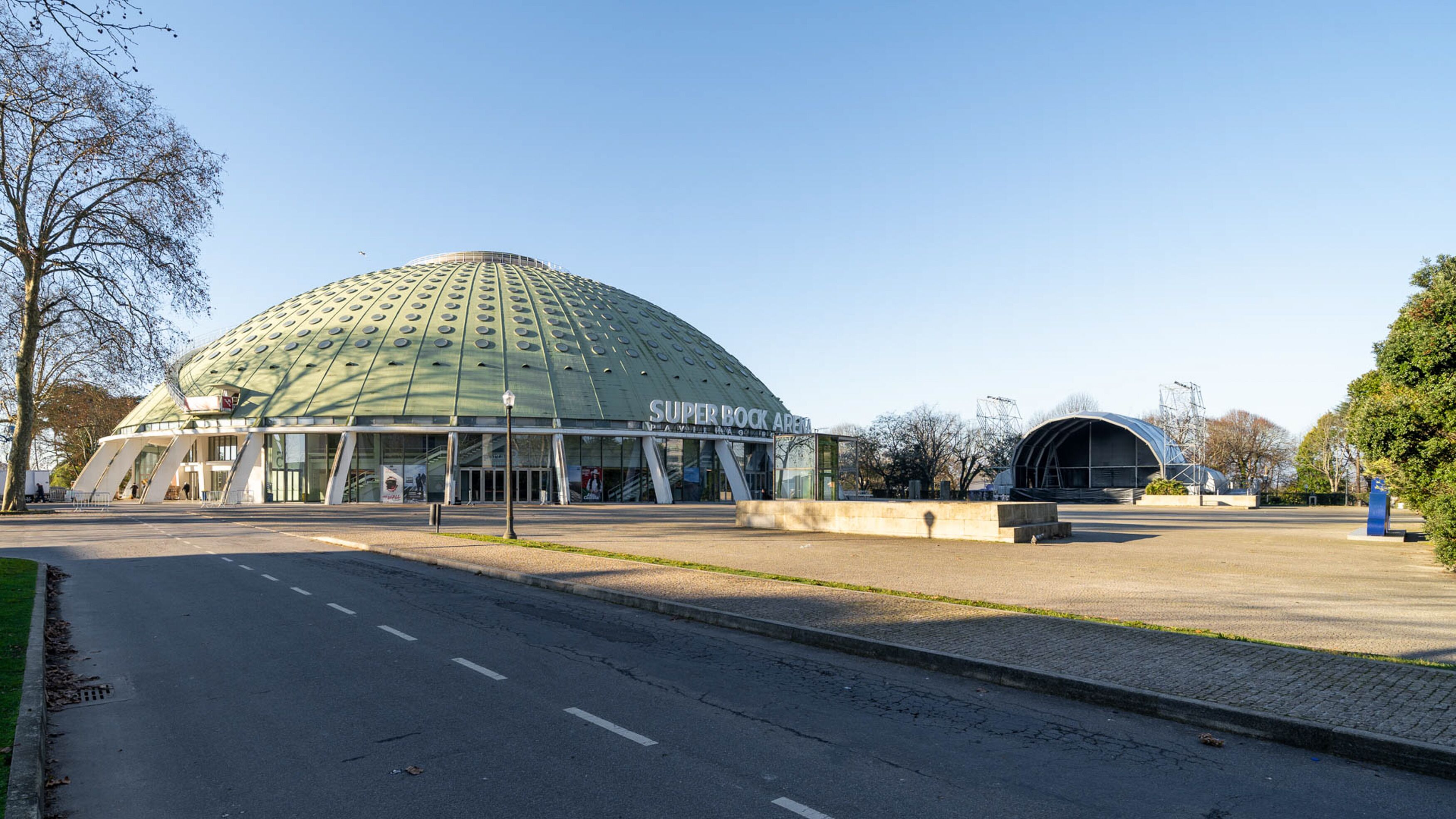 A modern building with a dome-shaped roof and a sign reading "SUPERBOOK AREA".