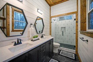 Shower, towels, soap, toilet paper