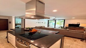 Fridge, microwave, stovetop, cookware/dishes/utensils - Your Tulum Country Club Gateway, 2 Bed 2 Bath Apartment at Anah (Akumal)