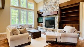 TV, fireplace, books, offices