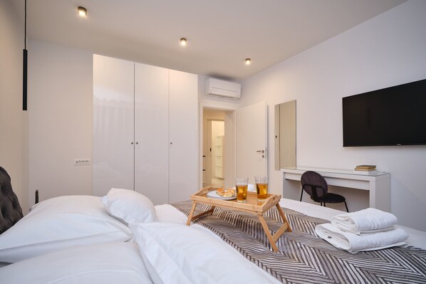 Apartamento | 2 quartos, individualmente decorados, individualmente mobiliados