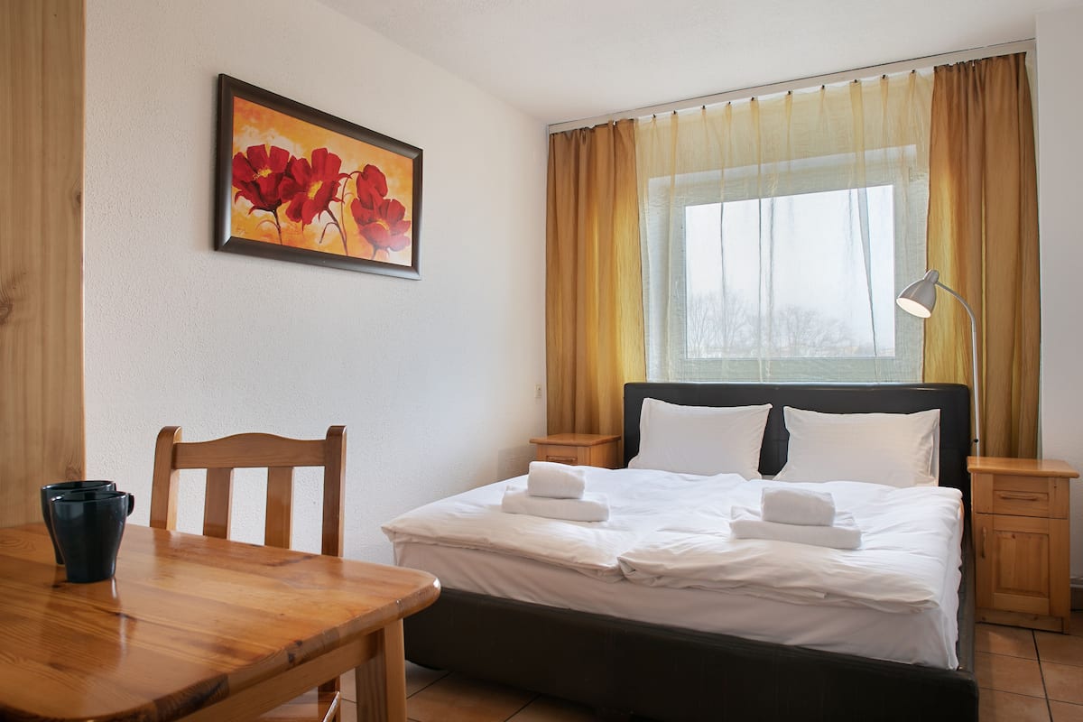Desk, laptop workspace, free WiFi, bed sheets