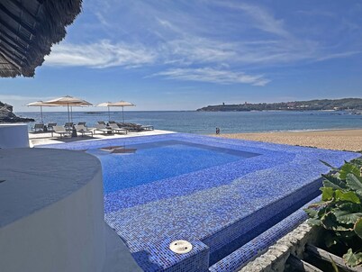 Beachfront condo with ocean view, private pool & resort amenities