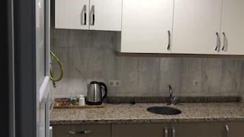Family Suite | Private kitchenette | Fridge