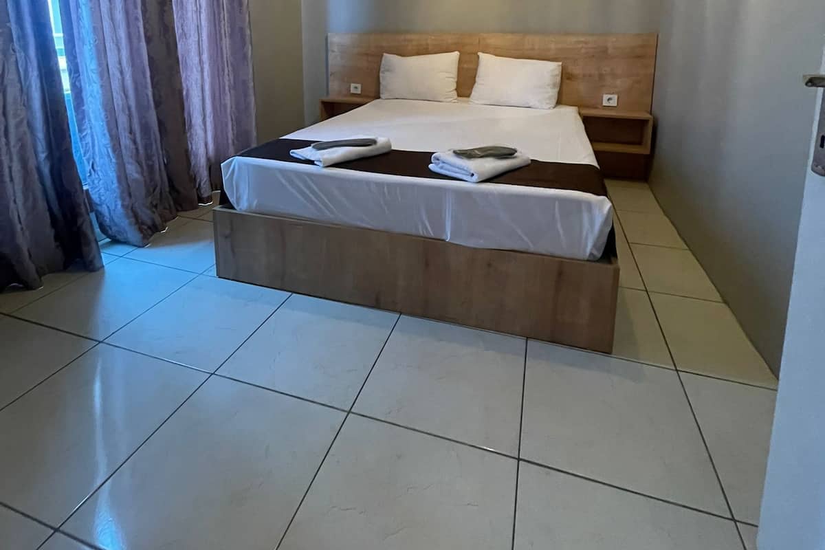 Economy Room, 1 Double Bed | Iron/ironing board, free WiFi