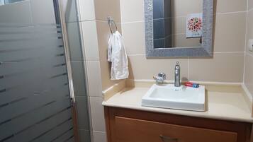 Exclusive Apartment | Bathroom | Rainfall showerhead, hair dryer, towels