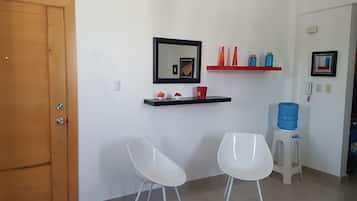 Exclusive Apartment | Living area | 42-inch flat-screen TV with cable channels, heated floors