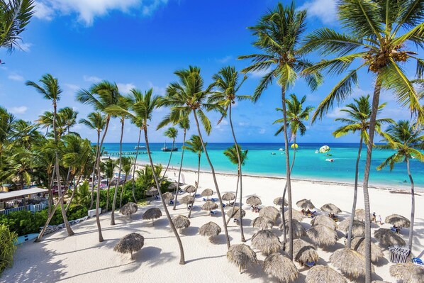 On the beach, sun loungers, beach towels