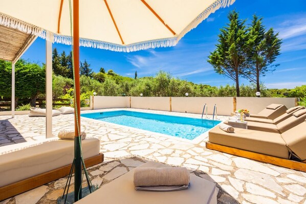 A swimming pool with lounge chairs and a pergola. - Villa Boscheto Tria - Three Bedroom Villa, Sleeps 6 (Ionian Islands)