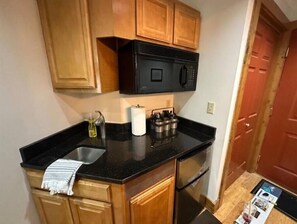 Fridge, microwave, coffee/tea maker, toaster