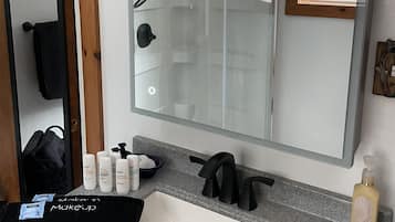 Hair dryer, towels, soap, shampoo
