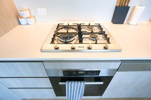 Fridge, microwave, oven, stovetop - Serenity in the Sky - 2BR Apt in Rundle Mall (Adelaide)