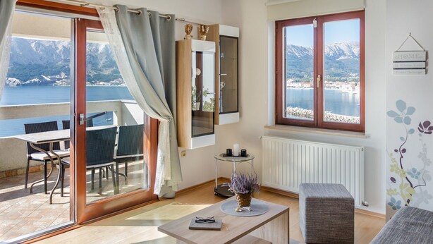 A modern living room with a balcony overlooking a lake and mountains. - Directly on the crystal clear Adriatic Sea (Baska)