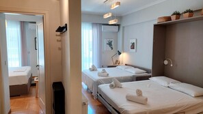1 dormitorio, tabla de planchar con plancha, wifi gratis y ropa de cama