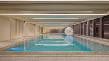 Indoor pool, open 6:30 AM to 10:30 PM, lifeguards on site