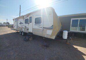 Exterior - Centrally located Cozy RV with all the essentials in spacious secure gated area! (Las Cruces)