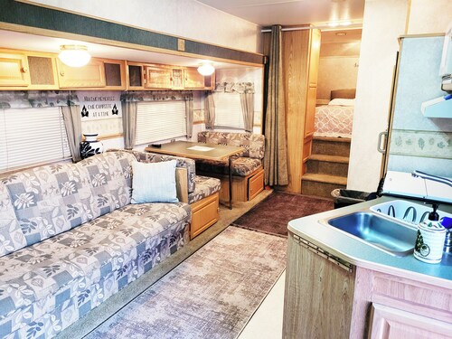 Centrally located Cozy RV with all the essentials in spacious secure gated area!