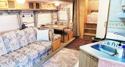 Centrally located Cozy RV with all the essentials in spacious secure gated area!