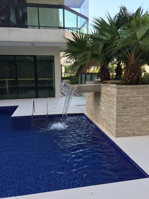 Apartment | Pool | Outdoor pool, open 9:00 AM to 10:00 PM, sun loungers - Riviera: M4 Giardino 44A, frente Praia, 4Dorms, 3Banh, 2Gar, Varanda Gourmet com Churrasqueira (Bertioga)