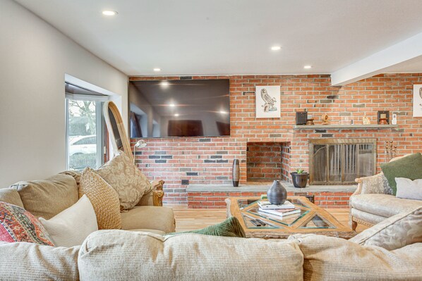 TV, fireplace, books
