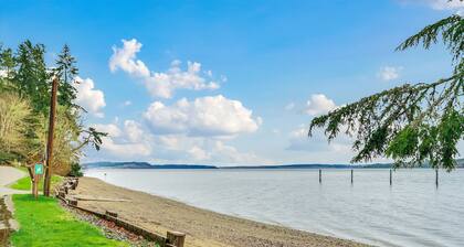 Dog-friendly storybook home in the trees with tennis, pickleball & beach access