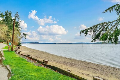 Dog-friendly storybook home in the trees with tennis, pickleball & beach access