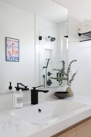 Hair dryer, towels, soap, toilet paper