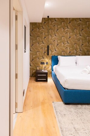 Iron/ironing board, travel crib, free WiFi, bed sheets