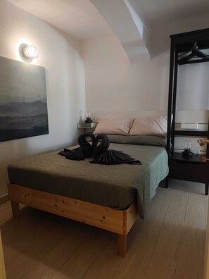 1 quarto, berço de viagem, Wi-Fi, roupa de cama