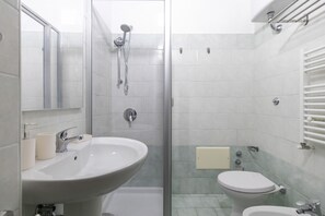 Deluxe Room, 1 Bedroom | Bathroom | Shower, rainfall showerhead, free toiletries, hair dryer - Rooms 339 (Naples)