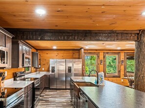 Signature Cabin | Shared kitchen | Full-size fridge, microwave, oven, stovetop