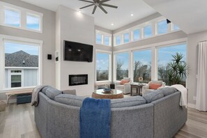 Smart TV, fireplace, books, stereo