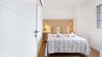 2 slaapkamers, een strijkplank/strijkijzer, gratis wifi, beddengoed