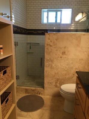 Shower, hair dryer, towels, soap
