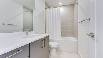 Hair dryer, towels, soap, toilet paper