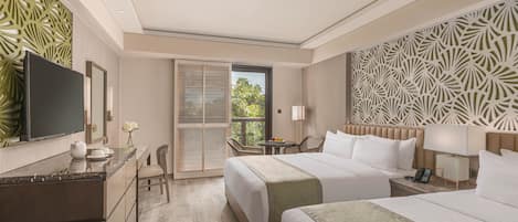 A hotel room with a bed, bedside tables, a desk, a chair, a TV, and a window with blinds.