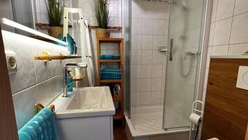 Shower, free toiletries, hair dryer, towels